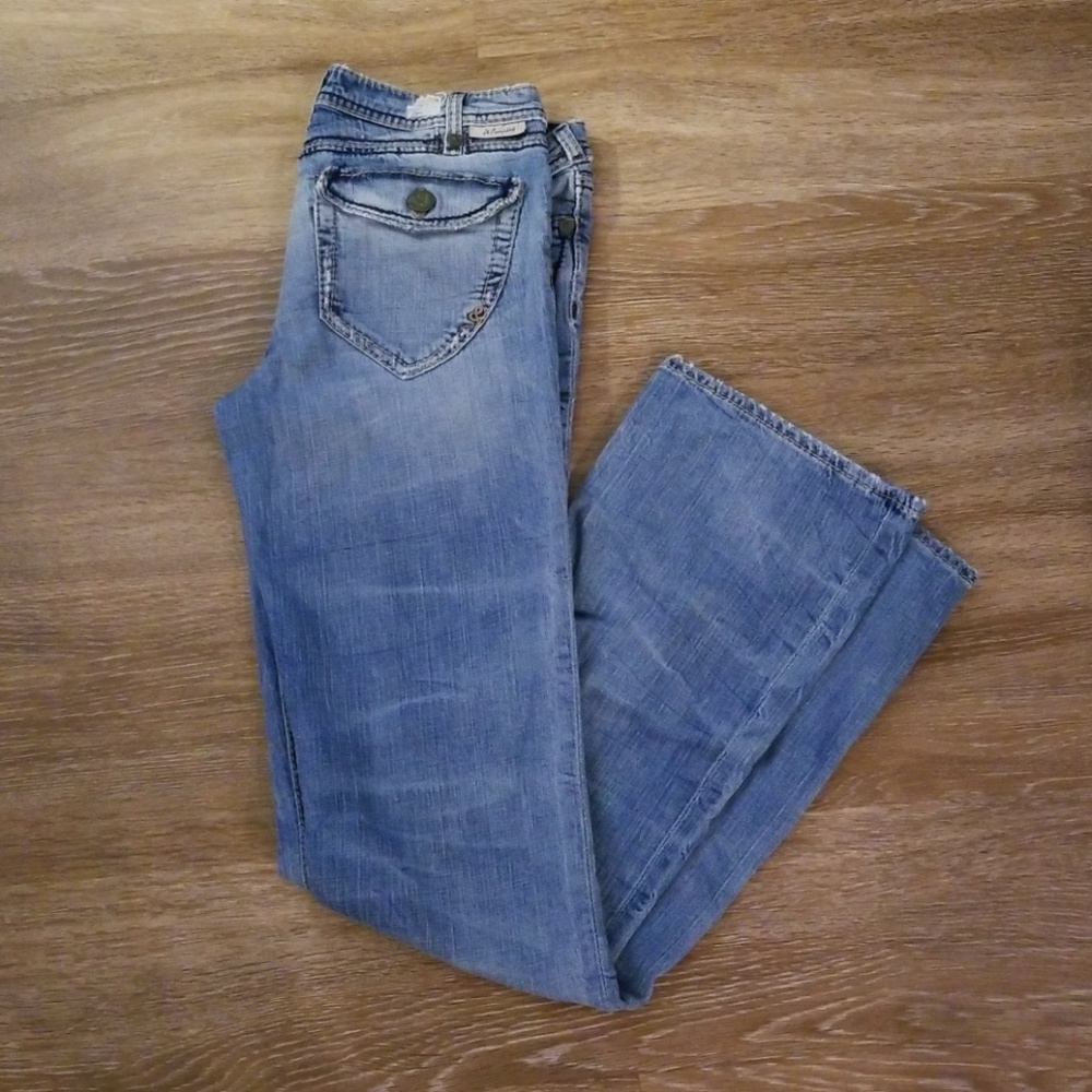 Light blue jeans, slightly distressed.